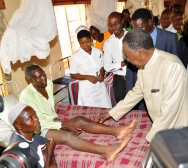 President Sata checks on a patient at Kamoto Hospital in Mambwe District on December 14,2013 -Picture by THOMAS NSAMA