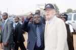 Vice-President Dr Guy Scott listens to Works, Supply, Transport and Communications minister Yamfwa Mukanga during the launch of Pave Zambia 2000 by President Sata in Lusaka’s Chawama Township on September 18,2013