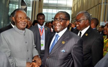 Sata and Mugabe at SADC meeting on the sidelines of the 22nd Ordinary Session of African Union at AU Conference Centre.