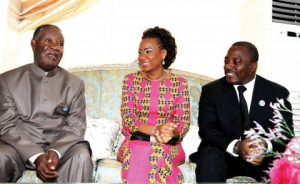DEMOCRATIC Republic of Congo President Joseph Kabila (right) and his wife madam Marie Olive Lembe Kabila with President Sata at State House in Kinshasa wait for other visiting heads of state attending the Seventh COMESA Summit. - Picture by EDDIE MWANALEZA.