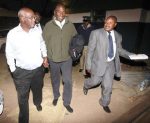 Former President Rupiah Banda’s son Andrew (C) is escorted by officers in Lusaka, on July 25, 2013 (AFP:File, Chibala Zulu)