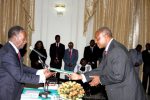 Justice Evans Hamaundu presents a report of the findings of the tribunal tasked to probe Minister of Justice Wynter Kabimba to President Michael Sata at State House on February 20,2014 -Picture by THOMAS NSAMA