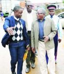 NAKONDE Immigration Officer in-Charge Mike Lisulo (left) explains the absorbent nature of the border between Zambia and Tanzania to newly appointed Muchinga Permanent Secretary Dr Bwalya Ngándu and Information Minister Mwansa Kapeya