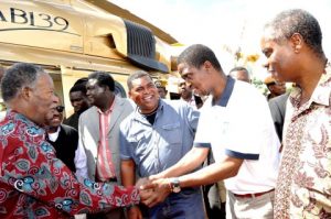 President Michael Sata being welcomed by Defence minister Edgar Lungu during a rally to drum up support for Katuba Constituency parliamentary candidate Moses Chilando on Feb 15,2015-Picture by THOMAS NSAMA
