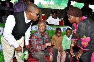 President Michael Sata introduces Justice minister Wynter Kabimba to Chieftainess Mungule as Maya Sibande and Square Lungu (in green)