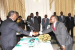 President Sata congratulates Industrial Relations Court deputy chairperson Judge Martin Musaluka during the Swearing-in-Ceremony at State House on February 20,2014 -Picture by THOMAS NSAMA