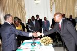 President Sata congratulates Industrial Relations Court deputy chairperson Judge Mathew Kasonde Chisunka during the Swearing-in-Ceremony at State House on February 20,2014 -Picture by THOMAS NSAMA