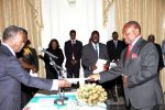 President Sata receives an Affidavit of Oath from Industrial Relations Court deputy chairperson Judge Egispo Mwansa during the Swearing-in-Ceremony at State House on February 20,2014 -Picture by THOMAS NSAMA