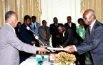 President Sata with Zambia’s Ambassador to Egypt Ali Simwinga during the swearing -in-ceremony at State House on February 12,2014 -Picture by THOMAS NSAMA