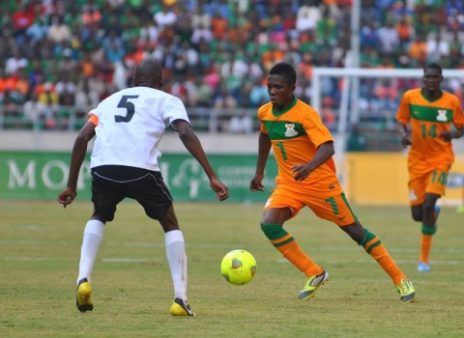 ZAMBIA midfielder Bruce Musakanya (right) tries to veer past Mumpati Thuma of Botswana