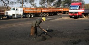 Trucks transporting coal at Collum Coal Mine in Southern Province. Image by Eddie Mwanaleza. Zambia, 2013.