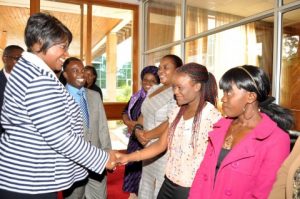 UNZA student Tilolele Mwanza greets First Lady Dr Christine Kaseba Sata when she arrived at Mulungushi International Conference Centre for the First Lady's Youth Mentorship Programme