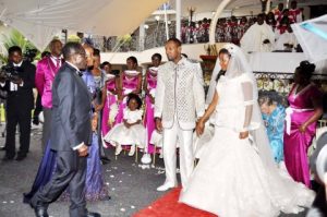 Zimbabwean President Robert Mugabe and First Lady Grace Mugabe during the wedding ceremony of their daughter Bona Mugabe and her husband Simba at their residence in Harare, Zimbabwe on March 1,2014