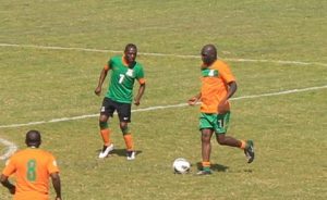 Kenneth ‘Bubble’ Malitoli being closely watched by Hillary Makasa. Bubble combined well with Kalu upfront in the first half