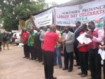 Kabimba presenting an award — in Kasama, Zambia.