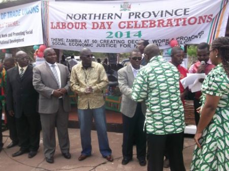 Kabimba presenting an award — in Kasama, Zambia.