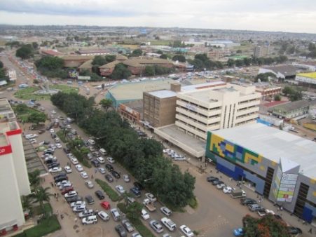 One of Lusaka's many confusing roundabouts clearly shows the Friday afternoon rush hour, complete with the blue minibuses you find throughout the city