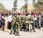 POLICE officers keep vigil of UPND cadres at the Kitwe High Court on August 2014. for Hakainde Hichilema. Mr Hichilema appeared in court for contempt of court charges that were later dropped. – Picture by NKOMBO KACHEMBA.