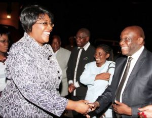 First Lady Dr Christine Kaseba being welcomed by ZNBC director of News and current affairs Kenneth Maduma on arrival at Zambezi Sun Hotel for the 2014 ZNBC: ZICTA Debate Time Southern Africa Grand Finale in Livingstone