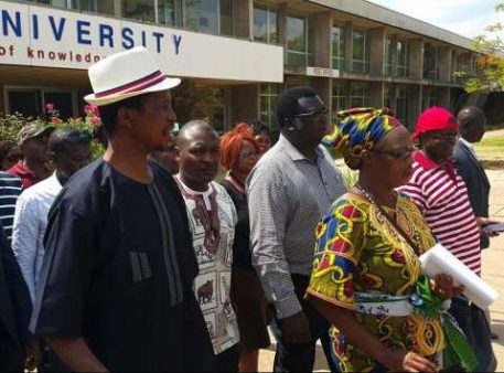Presidential Candidate Edgar Lungu spotted taking a walk on the grounds on Mulungushi. He is accompanied by MCC Willie Nsanda, former Diplomat Mumbi Phiri and Father Bwalya. PF General Conference 2014