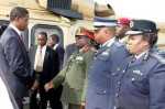 President Lungu talks to Zambia army commander Lt Gen Paul Mihova as ZAF Commander Lt Gen Eric Chimese and Inspector General of Police Stella Libongani looks on shortly before departure at Kenneth Kaunda International Airport for Angola