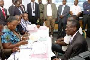 Chawama Constituency PF Parliamentary Candidate Lawrence Sichalwe filling in his nomination papers for Chawama Constituency by Elections Slated for April 14.