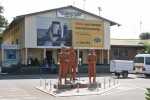 Harry Mwaanga Nkumbula International Airport with statues of Livingstone, Chuma and Susi in front