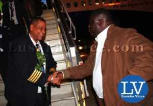 Minister of Transport and Communication Christopher Yaluma greeting the Rwandair Director of Flight Operations Santos Pio after landing - Photo Credit Jean Mandela - Lusakavoice.com