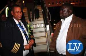 Minister of Transport and Communication Christopher Yaluma greeting the Rwandair Director of Flight Operations Santos Pio after landing - Photo Credit Jean Mandela - Lusakavoice.com