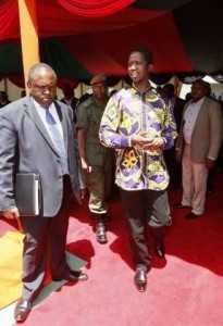 President Edgar Chagwa Lungu (second from right) leaves Heroes Stadium in Lusaka,Zambia on Sunday,March 8,2015. President Lungu had to leave the women's day commemoration on advise of doctors who detected traces of malaria and fatigue.. PICTURE BY SALIM HENRY/STATE HOUSE