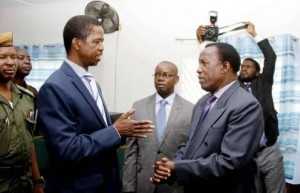 President Edgar Chagwa Lungu speaks with ECZ Commissioner Judge Chulu at Chawama Basic school on March 10,2015, where he witnessed the filling in of nomination papers of Chawama Constituency PF Parliamentary Candidate Lawrence Sichalwe