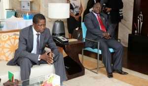President Edgar Lungu talks to Zambia army Commander Lt Gen Paul Miyova of MGM Grand Hotel in Sanya ,China on Friday 27-03-2015 -PICTURE BY EDDIE MWANALEZA:STATEHOUSE.