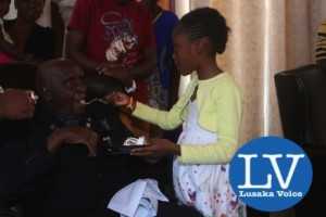 KK grand daughter Tiyezye Kaunda does feed him - Photo Credit Jean Mandela - Lusakavoice.com