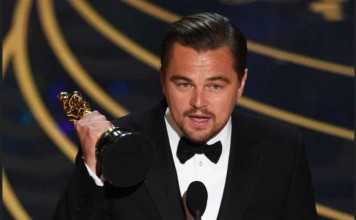 Leonardo DiCaprio accepts the award for best actor in The Revenant