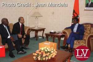 President Edgar Chagwa Lungu conferring with Bharti Airtel CEO and Chairman Sunil Bharti Mittal while looking on is Airtel Networks Zambia Plc Board Chairman George Sokota.