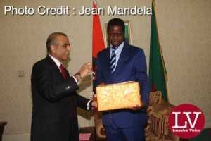 President Edgar Chagwa Lungu conferring with Bharti Airtel CEO and Chairman Sunil Bharti Mittal while looking on is Airtel Networks Zambia Plc Board Chairman George Sokota.