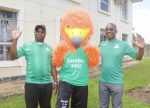 Sports Minister Moses Mawere with FAZ President Andrew Kamanga posing with U20 AFCON Championship mascot "Nkwazi" at Football House.